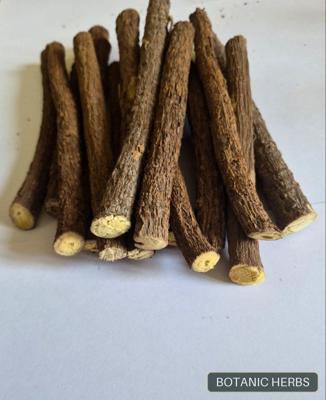 Cleaned licorice root sticks prepared for industrial supply
